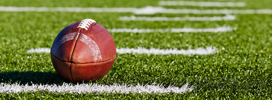 Football on Field During Football Game