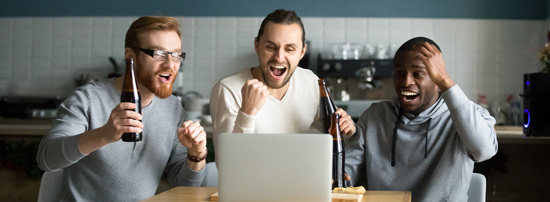 Friends Celebrating Sports Betting Win at Home