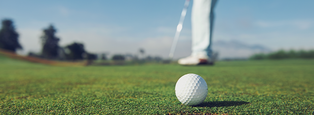 Man Putting on Golf Course