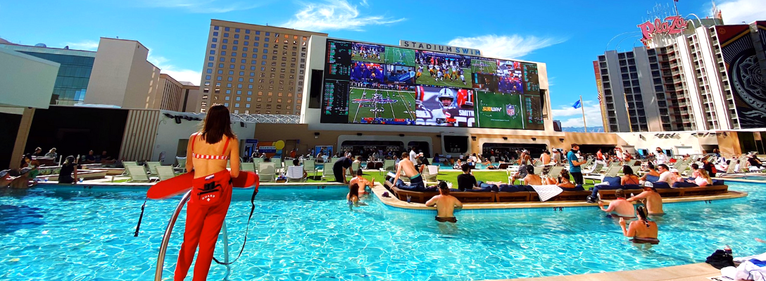 People Watching Sports at Stadium Swim® Pool in Vegas