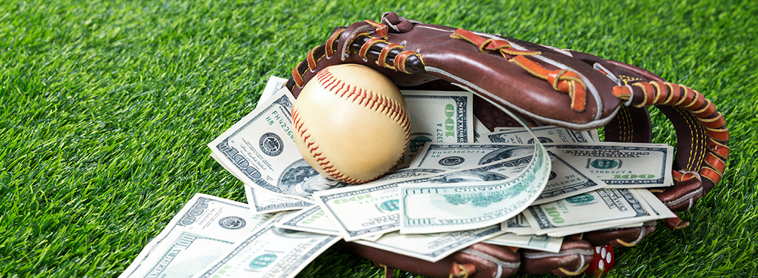 Baseball Glove with Money Won from Sports Betting