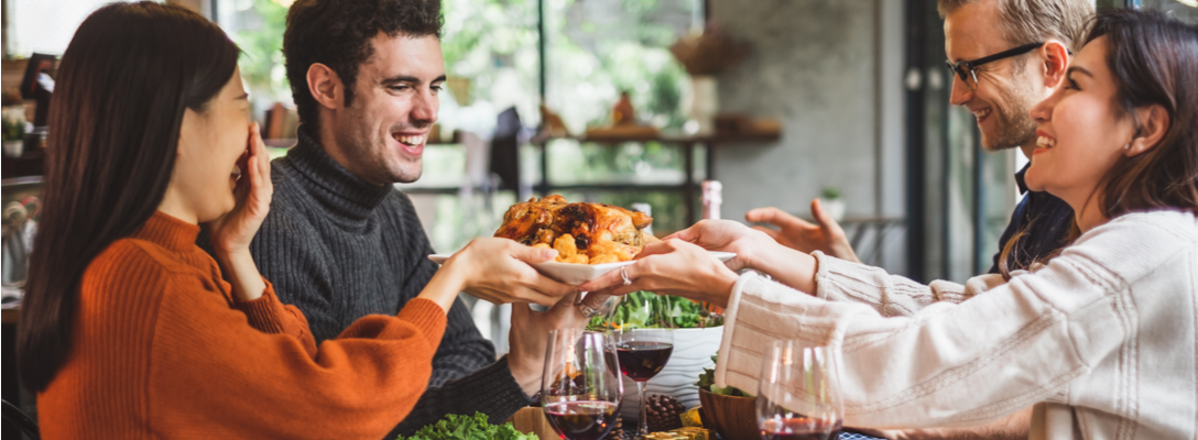 Friends Enjoying Las Vegas Thanksgiving Meal at Restaurant