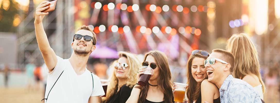 Friends in Front of Stage at Music Festival in Las Vegas