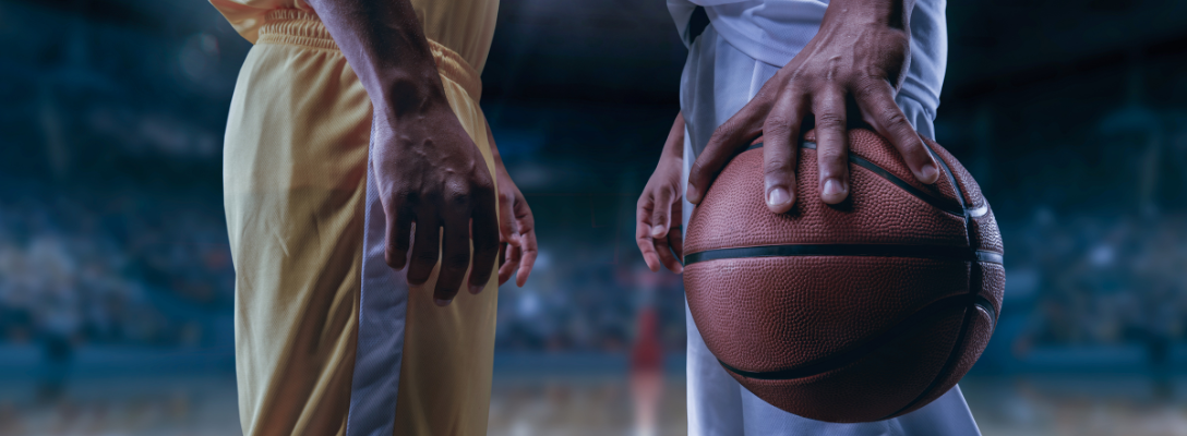 Professional Basketball Players with Ball During Game