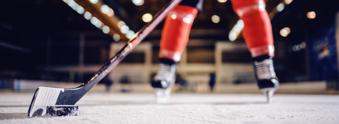 Hockey Player on Ice During Professional Hockey Game