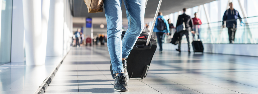 Man Traveling with Suitcase for First Time in Las Vegas